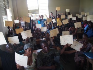 Students Proudly Showing Off Certificates at the End of a Day of Study